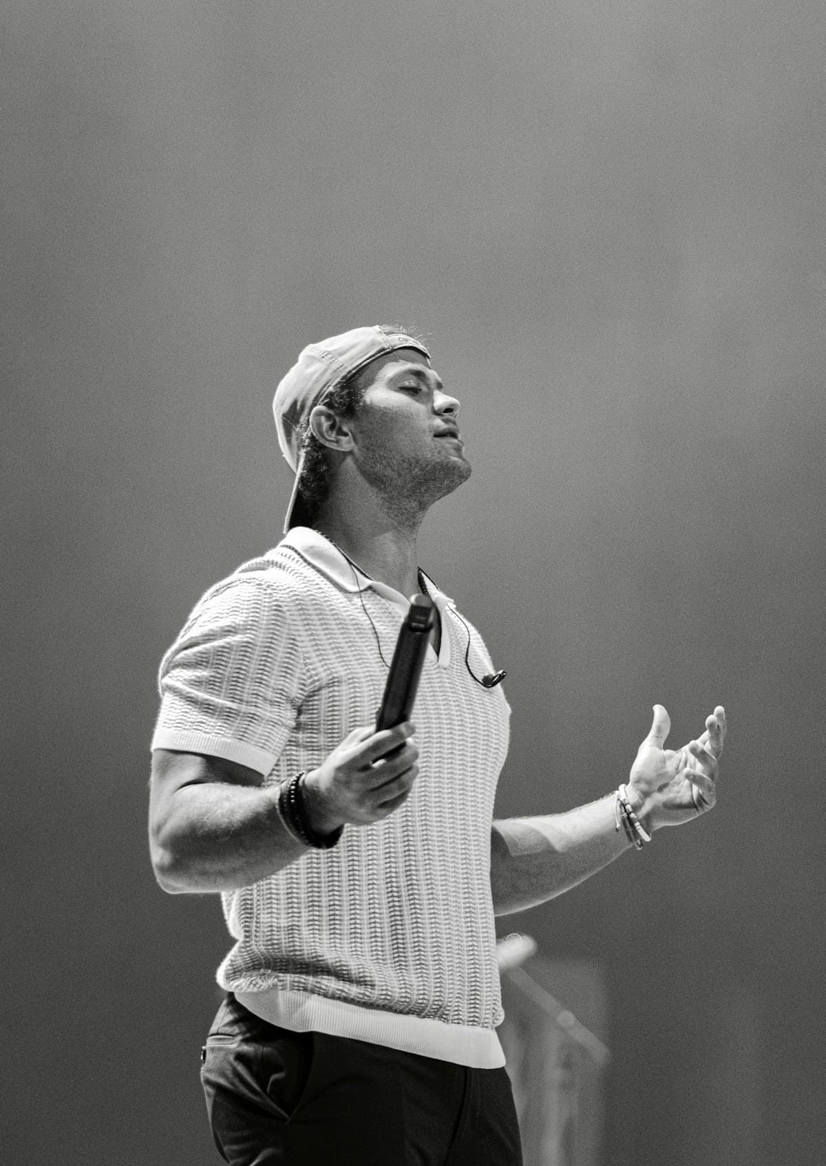 Joe Lammers performing, microphone in hand